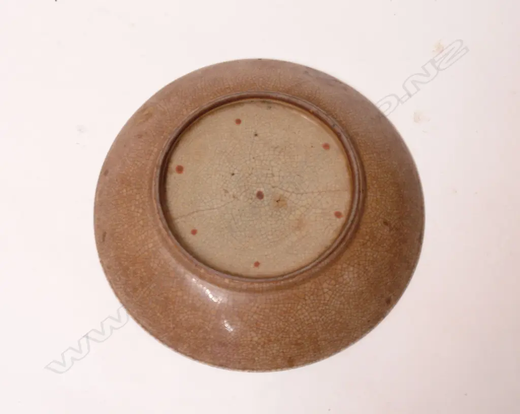 An early Sung Provincial celadon crackleware dish Image 1++