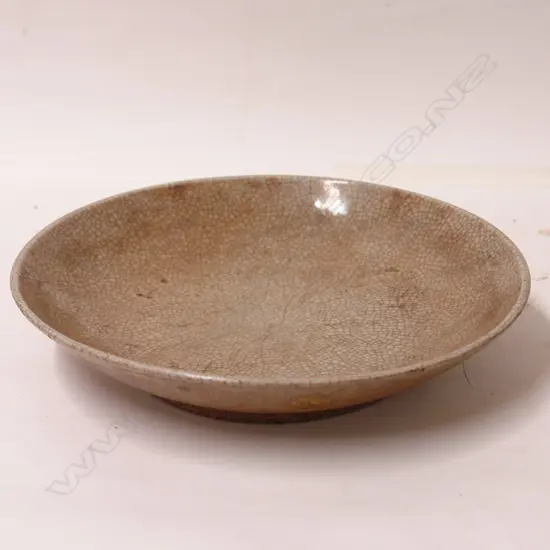 An early Sung Provincial celadon crackleware dish