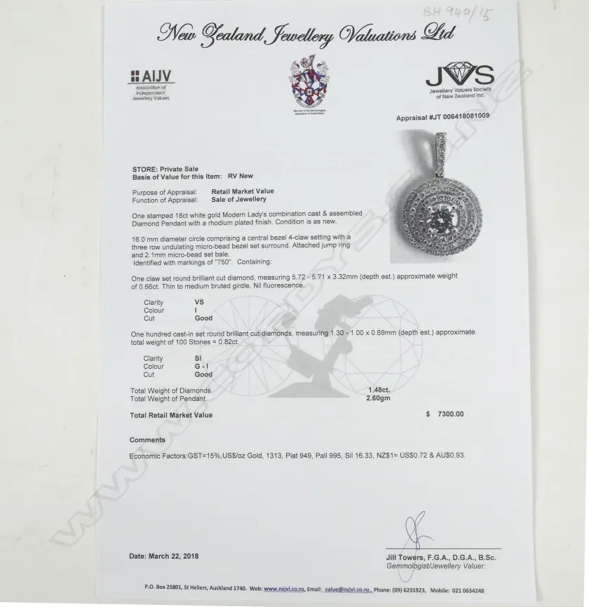 An 18ct. white gold and diamond pendant Image 1++