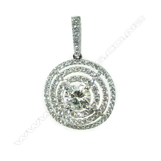 An 18ct. white gold and diamond pendant