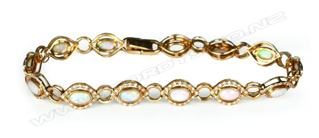 A stylish 18ct. yellow gold opal and diamond bracelet Image 1++