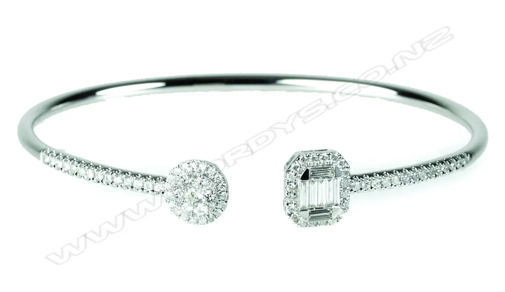 A lady's 18ct. white gold and diamond bangle Image 1++