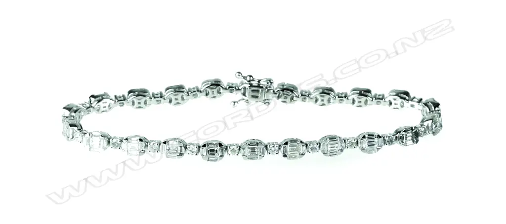 A lady's impressive 18ct. white gold and diamond tennis bracelet Image 1++
