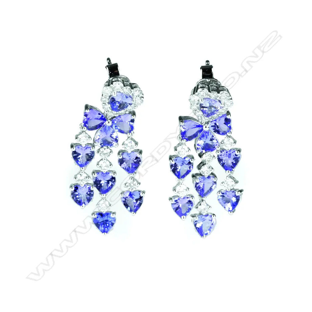 A pair of modern 18ct. white gold tanzanite and diamond earrings Image 1++