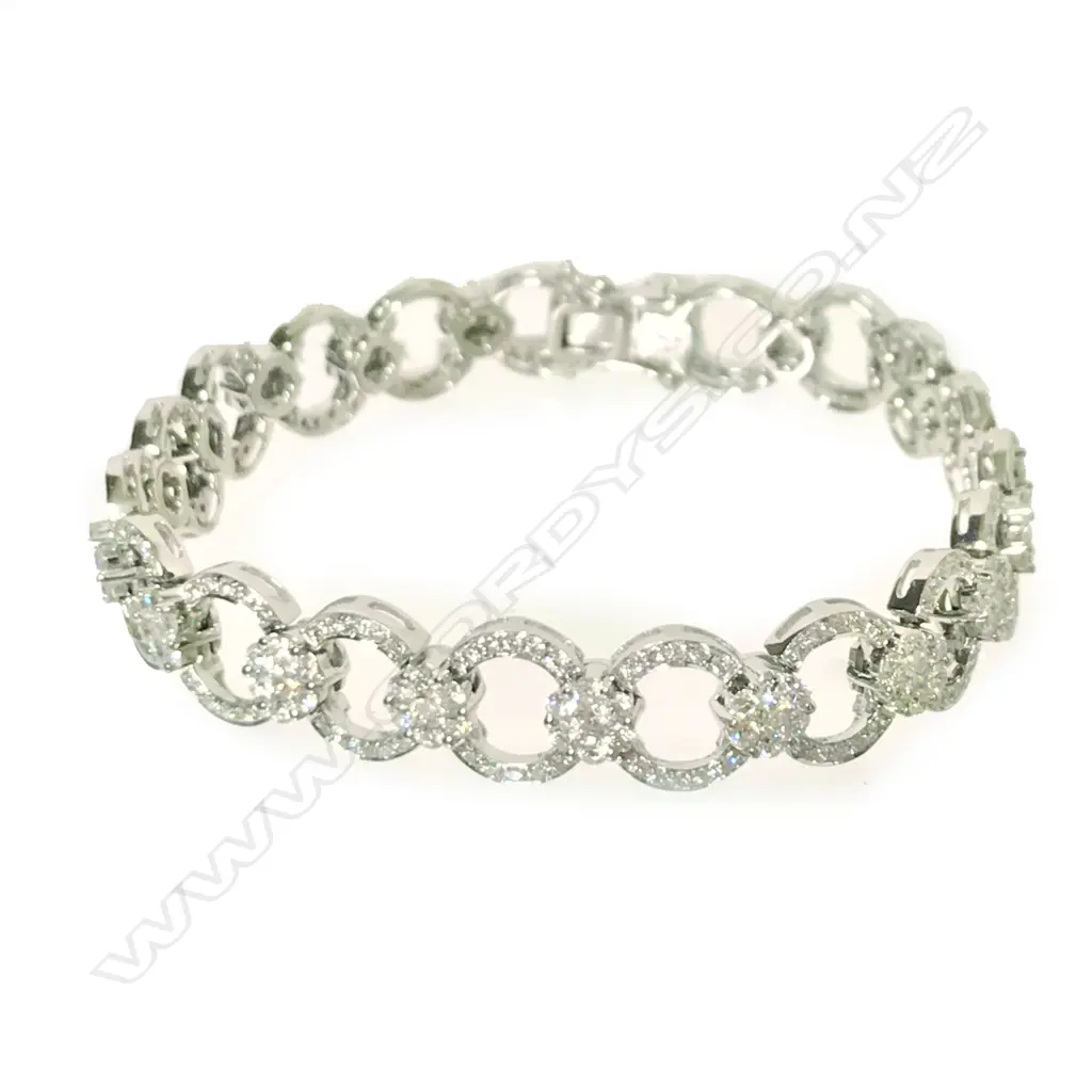 An 18ct. white gold and diamond bracelet Image 1++