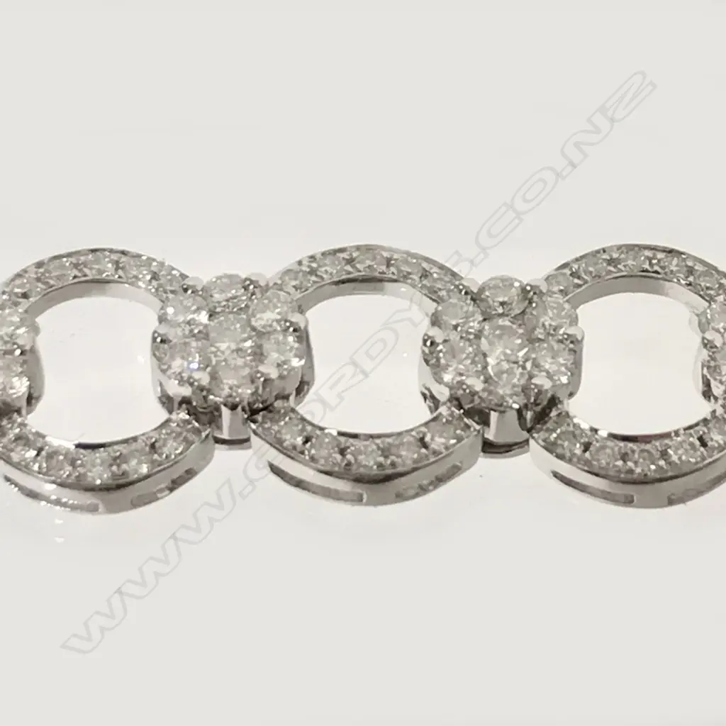 An 18ct. white gold and diamond bracelet Image 1++