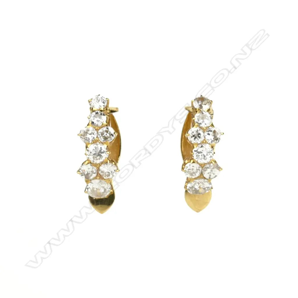 A pair of 18ct. gold and diamond earrings Image 1++