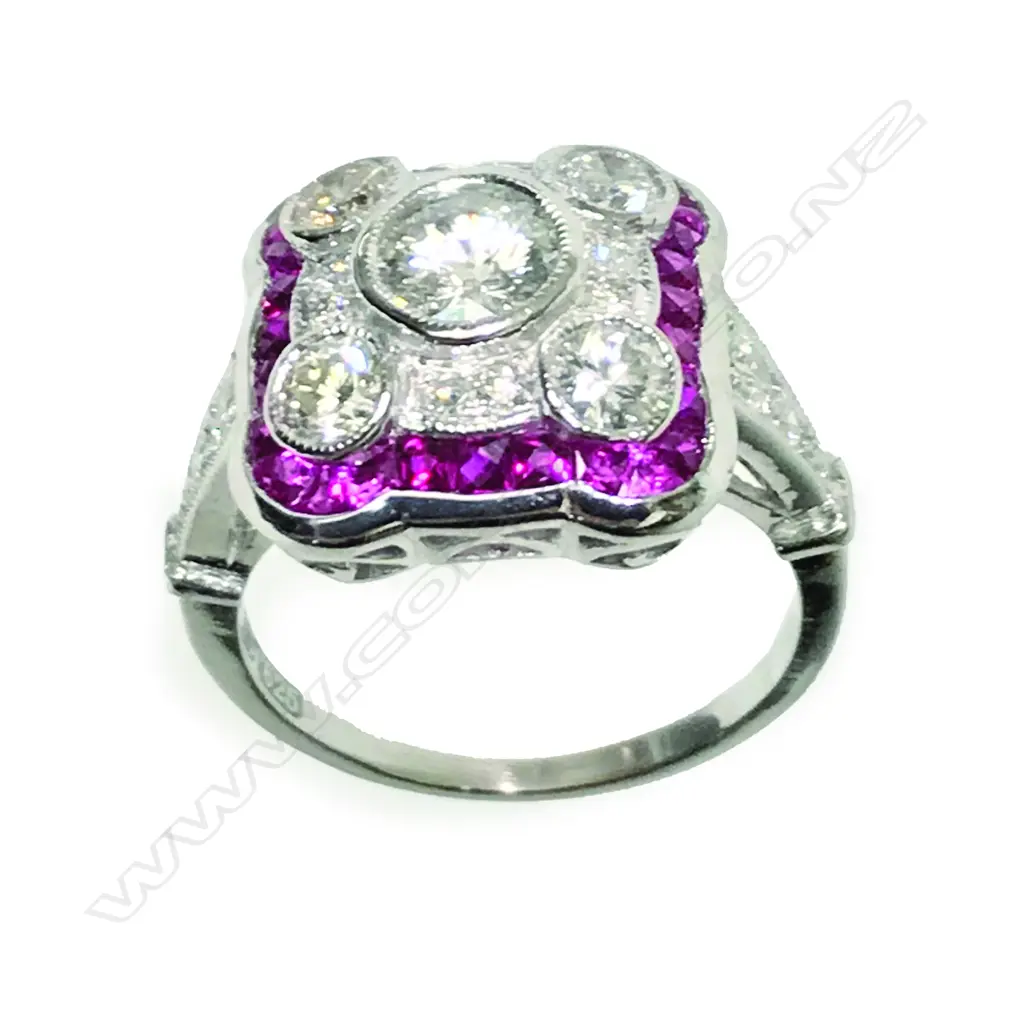 An Art Deco style 10ct. white gold diamond and ruby ring Image 1++