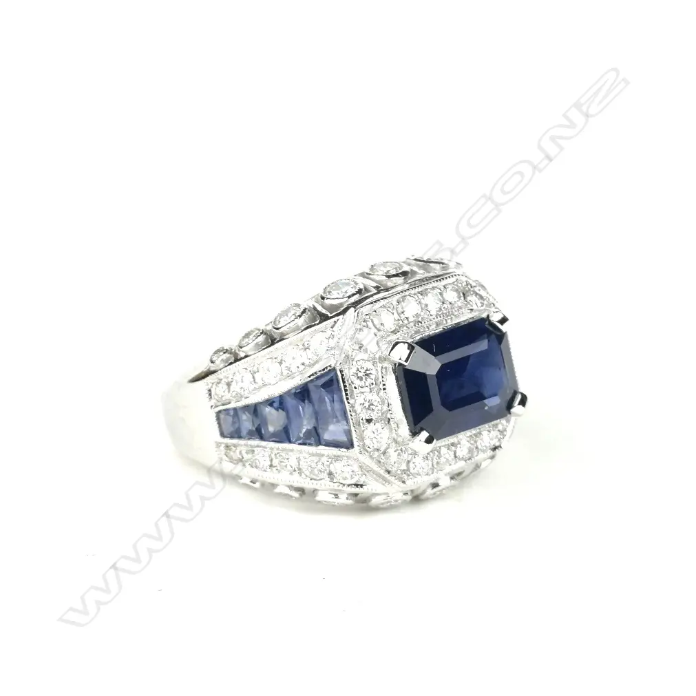 A 10ct white gold sapphire and diamond dress ring Image 1++