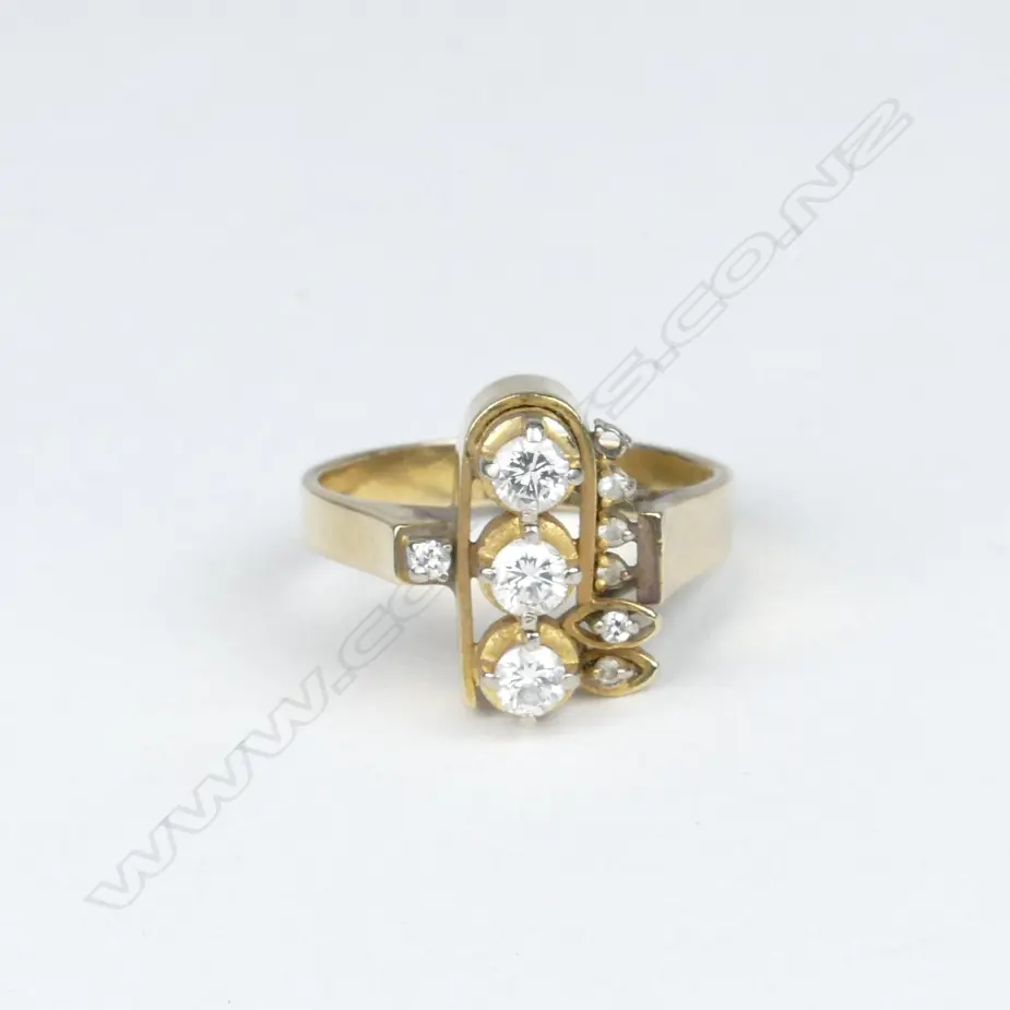 A 14ct. gold and diamond ring Image 1++