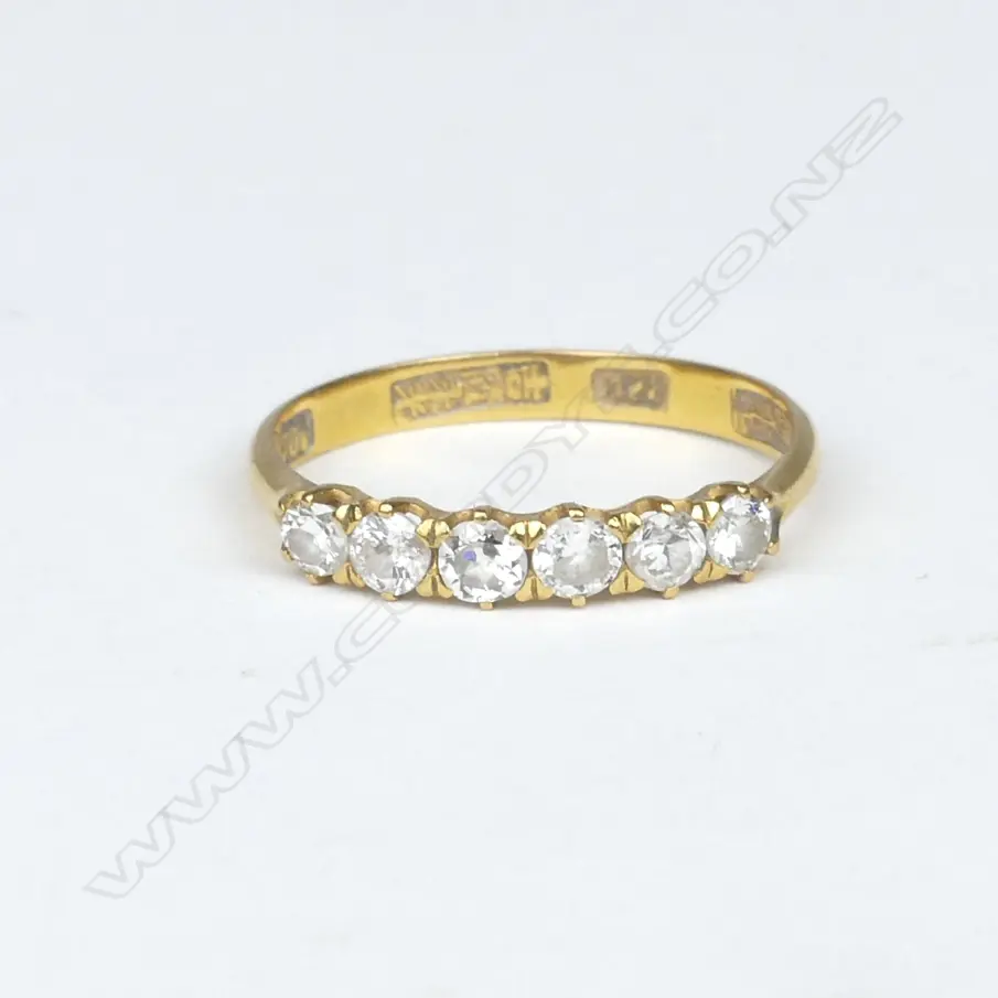 A 22ct. gold and diamond band Image 1++