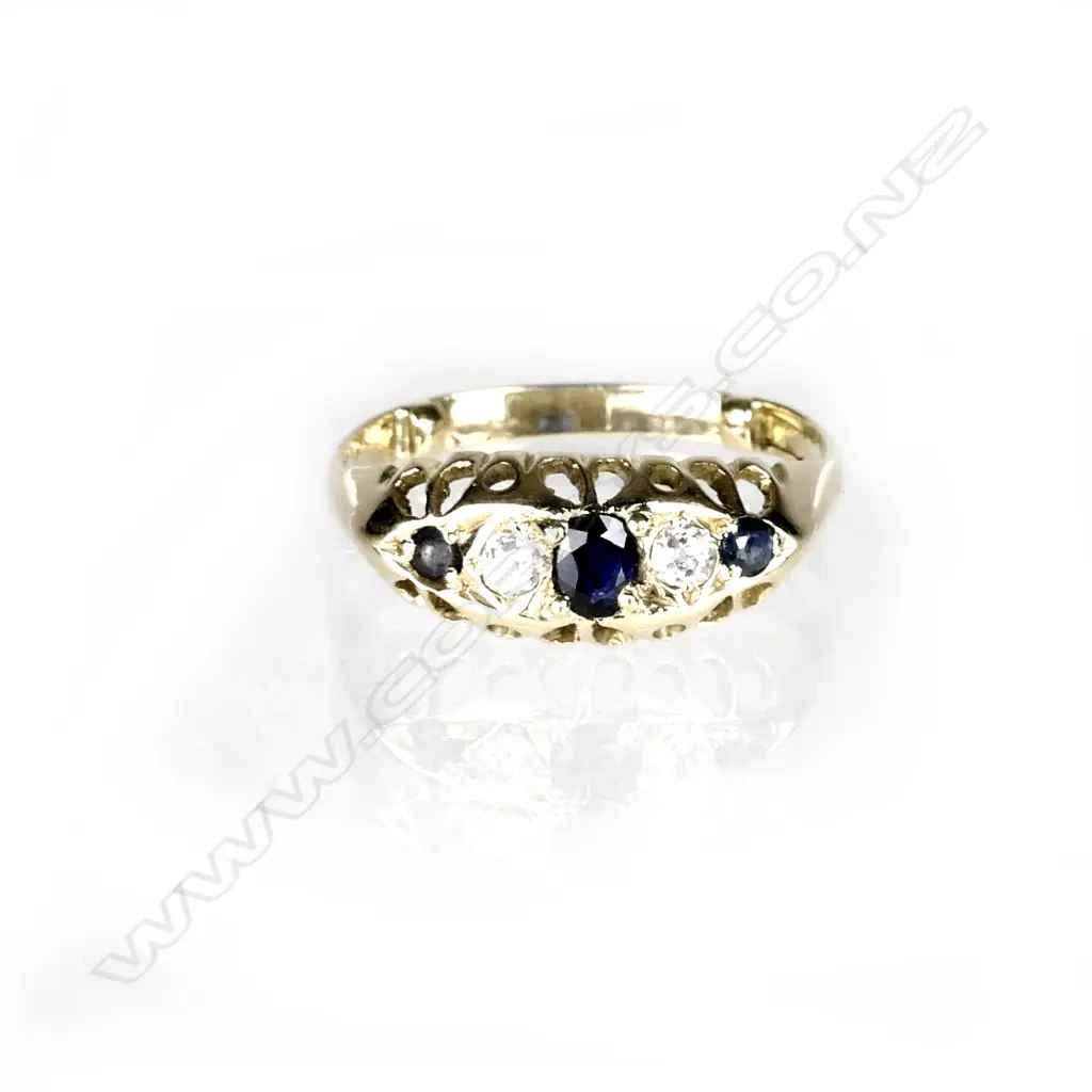 A lady's estate 18ct. yellow gold sapphire and diamond ring Image 1++