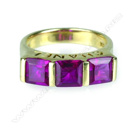 A vintage 14ct. yellow gold Chanel triple red stone ring