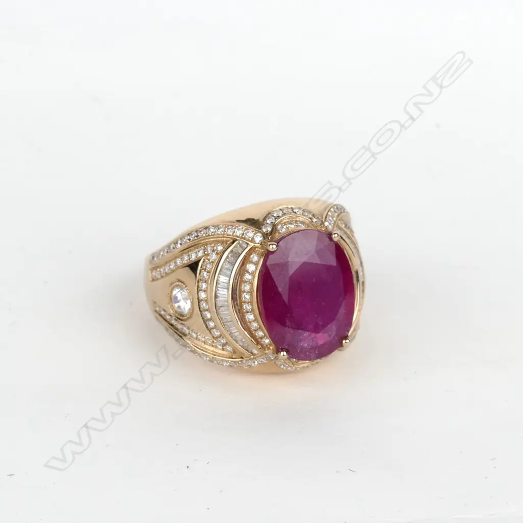 An 18ct. rose gold ruby dress ring Image 1++