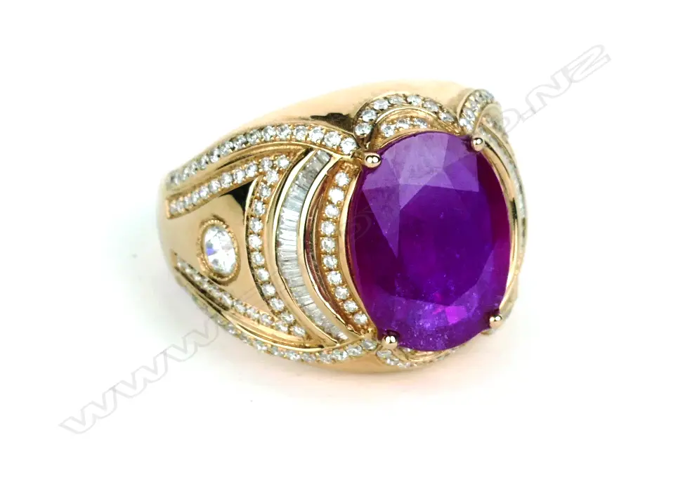 An 18ct. rose gold ruby dress ring Image 1++