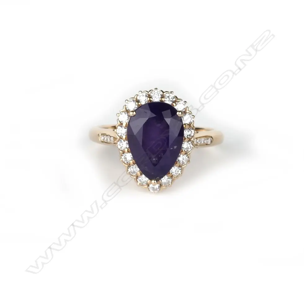 An 18ct. rose gold amethyst and diamond ring Image 1++