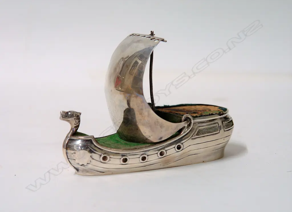 An early 20thC silver Arts & Crafts Viking ship pin cushion Image 1++