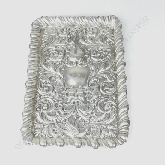 An Edwardian silver dressing table tray