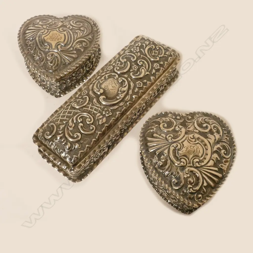 Three embossed silver dressing table boxes Image 1++