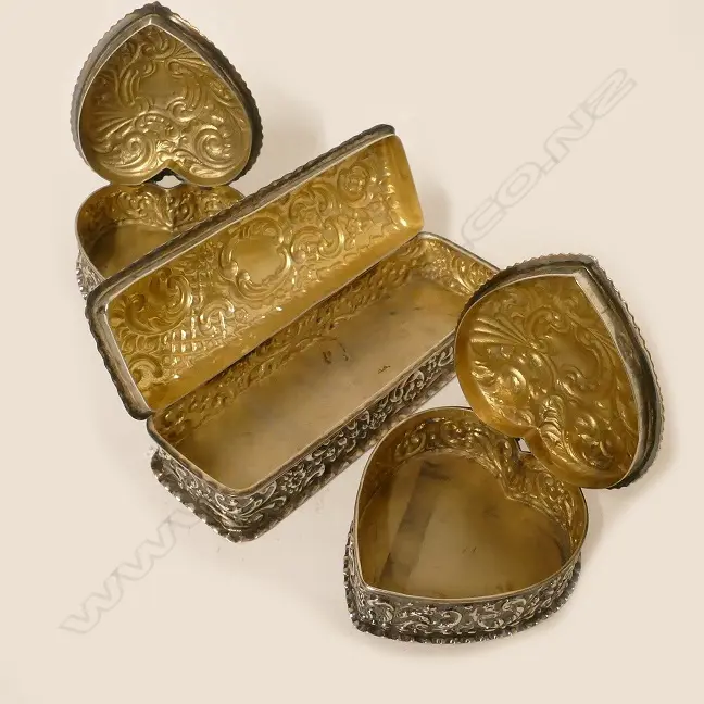 Three embossed silver dressing table boxes Image 1++