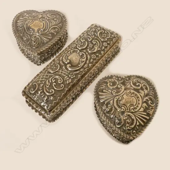 Three embossed silver dressing table boxes