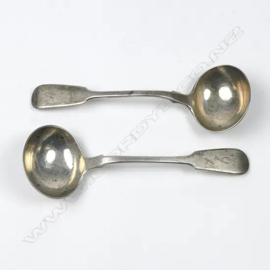 A pair of Victorian silver sauce ladles