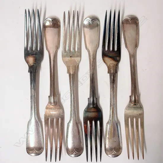 A set of six George IV heavy silver fiddle and thread pattern table forks