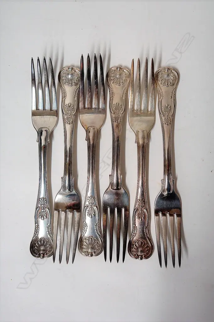A set of six George IV heavy silver King's pattern table forks Image 1++