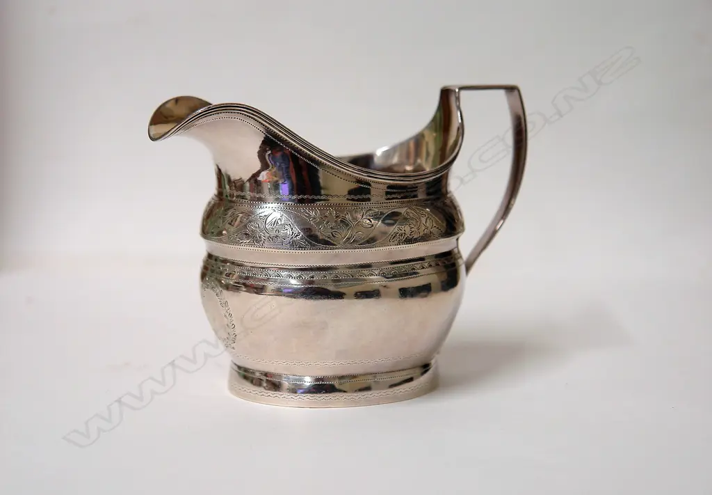 A George II helmet form cream jug Image 1++
