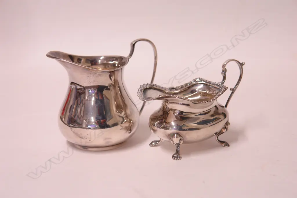 Two silver cream jugs Image 1++