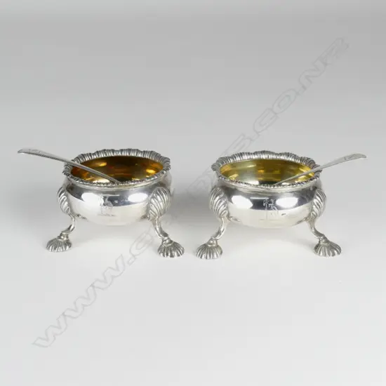 A pair of George III silver salts with spoons