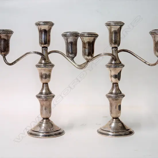 A pair of 'AMC' American silver table candelabra