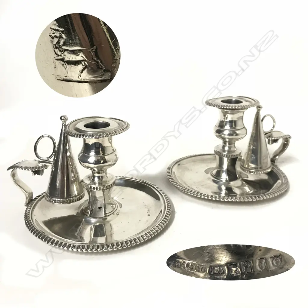 A pair of George III Irish silver chambersticks Image 1++