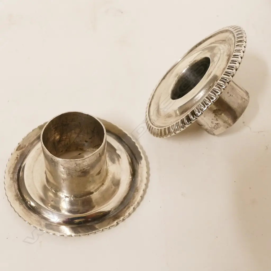 A pair of George III Irish silver chambersticks Image 1++