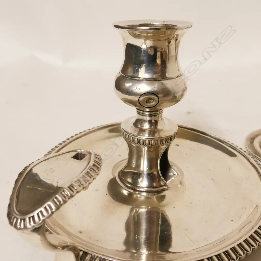 A pair of George III Irish silver chambersticks Image 1++