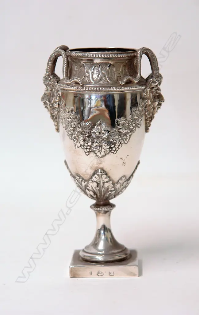 A late 19thC German Hanau Bacchanalian silver urn form vase Image 1++
