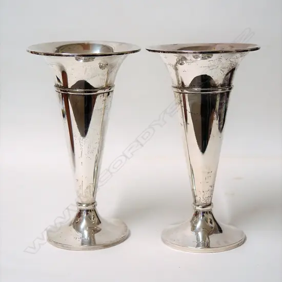 A pair of 1920s large silver trumpet vases
