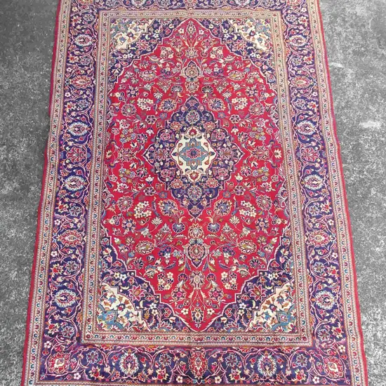 A large good quality hand knotted Persian Kashan rug