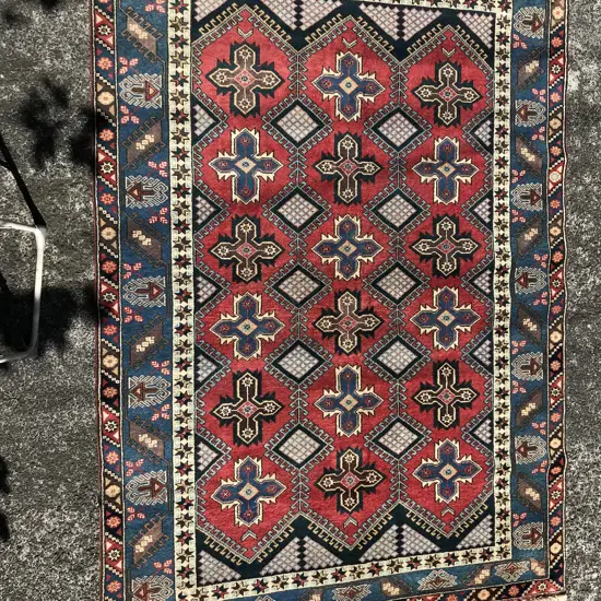 An Iranian hand knotted carpet
