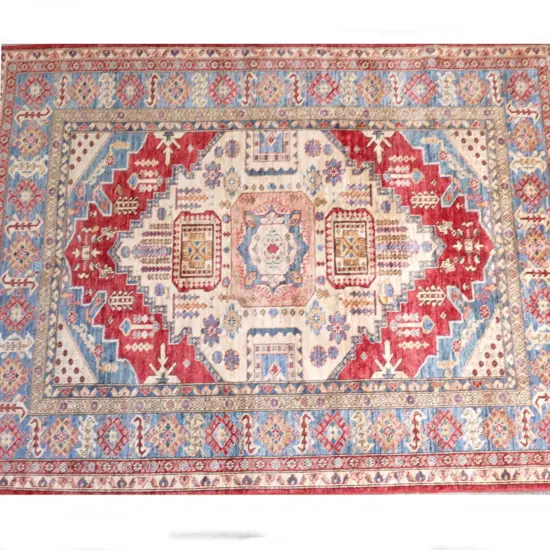 A hand knotted Kazak carpet
