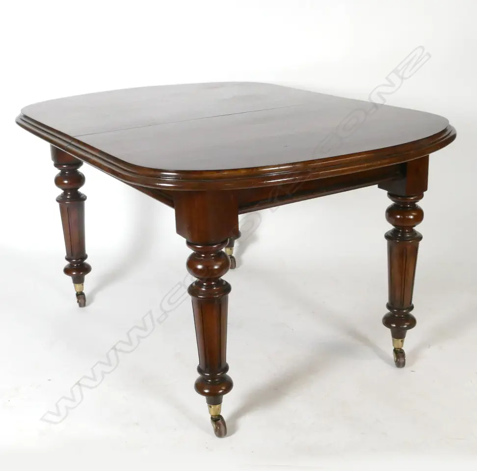 A Victorian mahogany D-end crank action extension dining table Image 1++