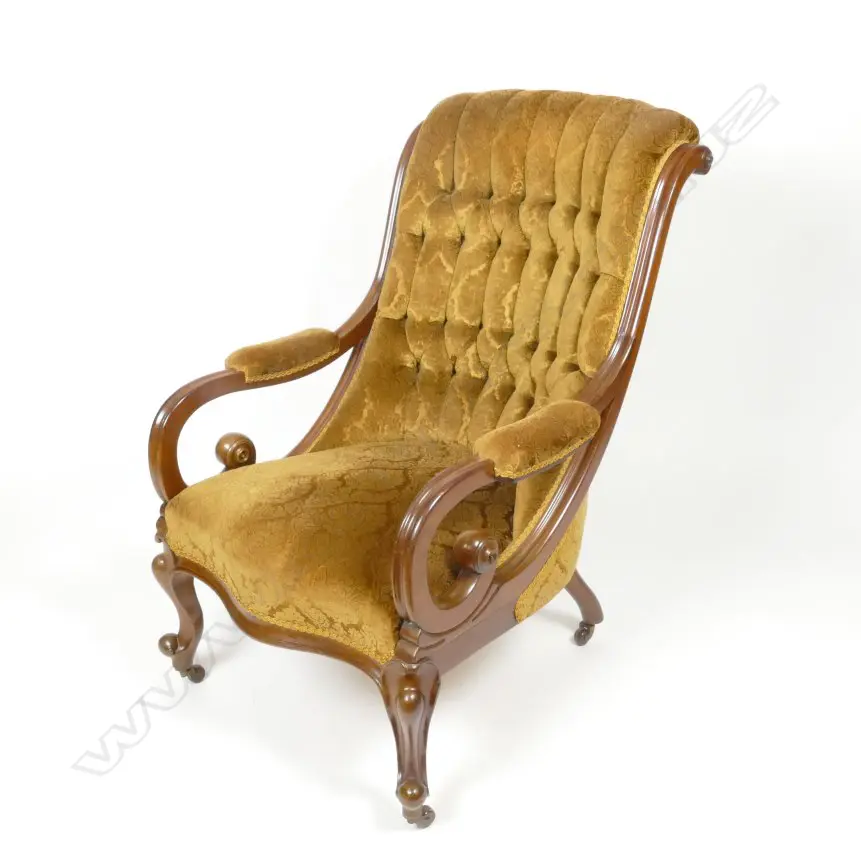 A Victorian mahogany open elbow library chair Image 1++