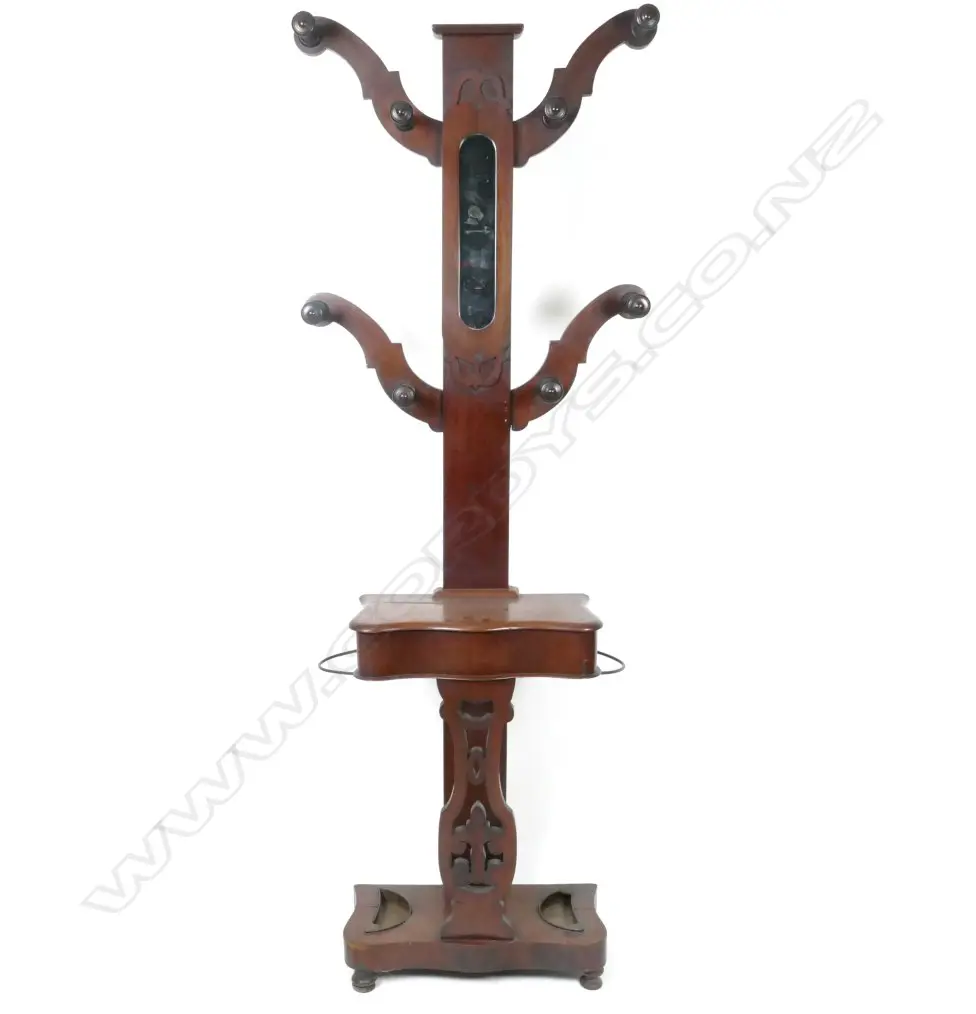 A Victorian mahogany four branch hall stand with eight turned coat pegs Image 1++