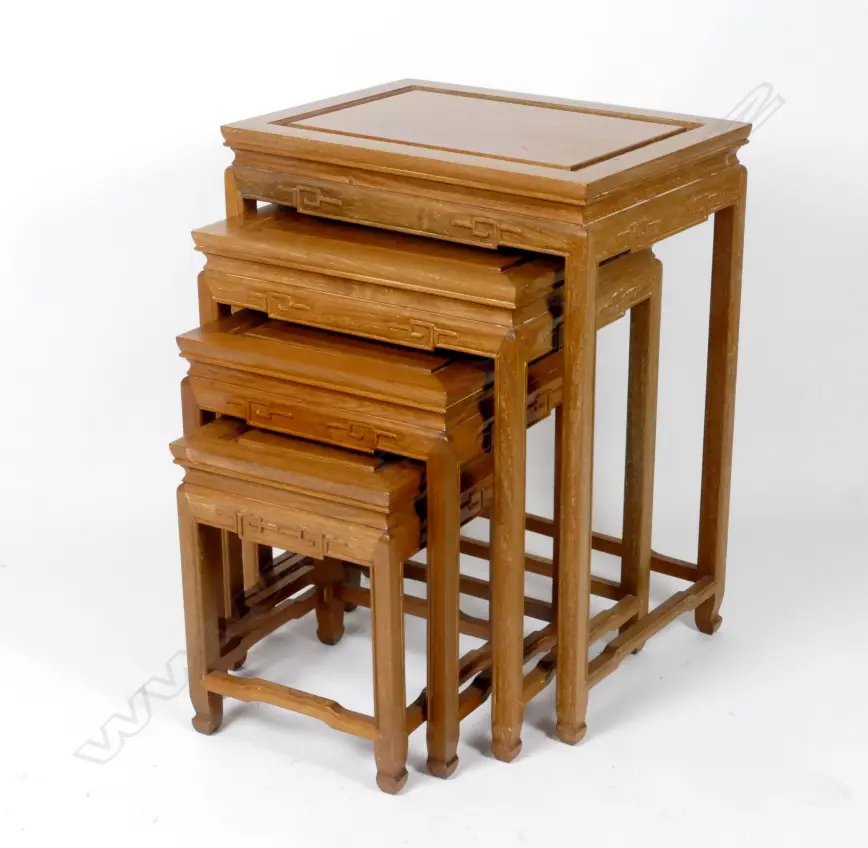 A nest of four Chinese teak side tables Image 1++