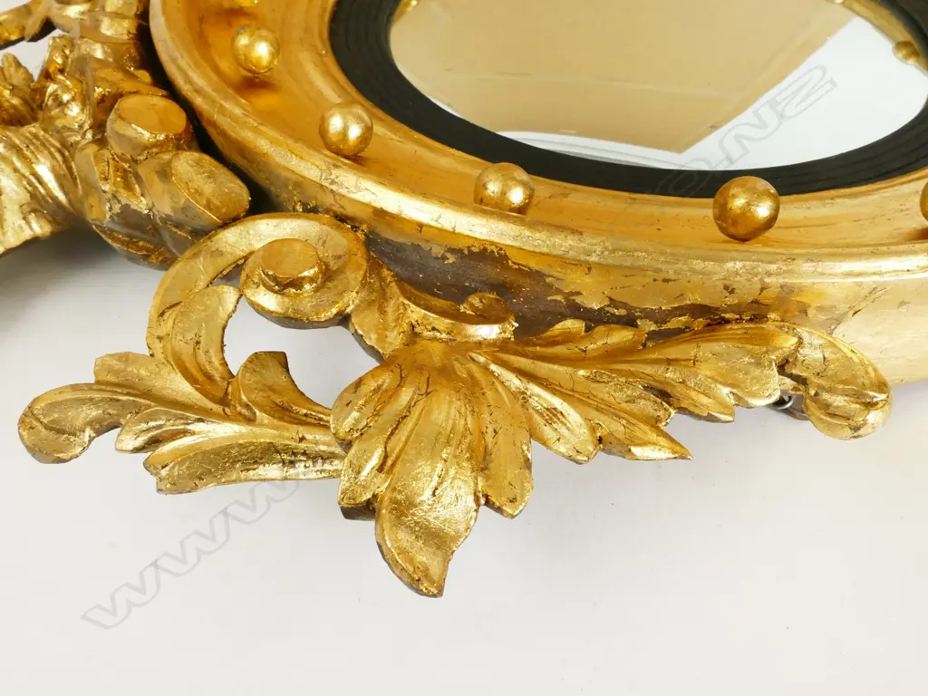 A 19thC circular wall mirror of Regency style Image 1++