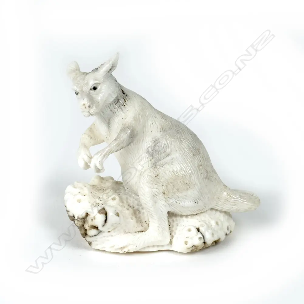 A small carved antler figurine Image 1++