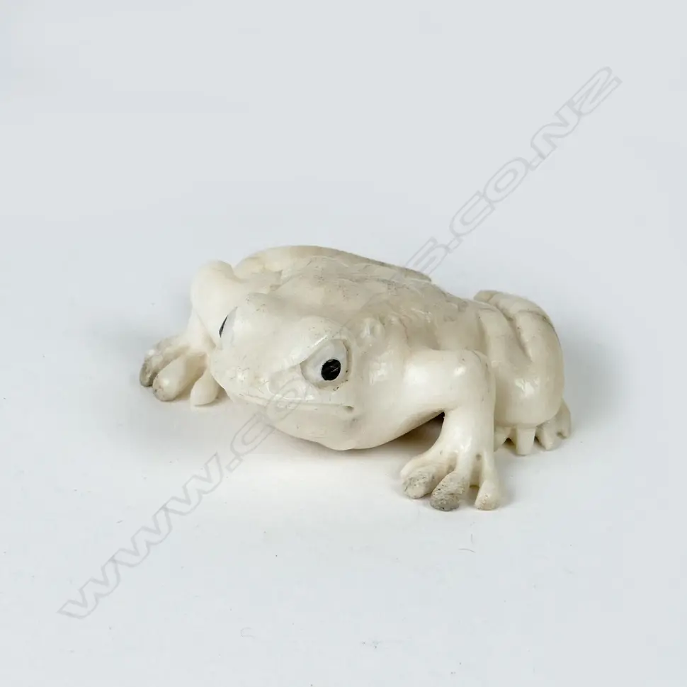 A small carved antler figure Image 1++