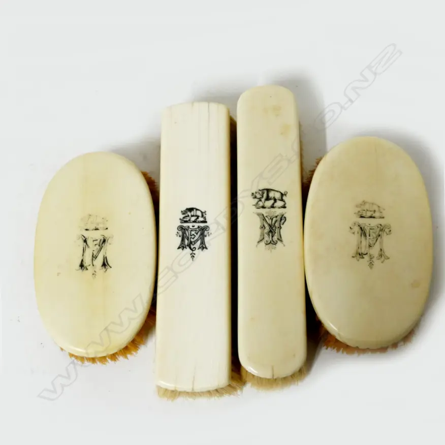 Four 19thC ivory mounted dressing table bristle brushes Image 1++