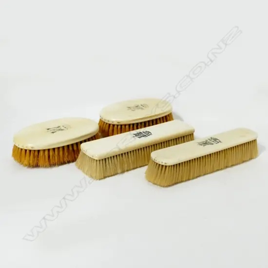 Four 19thC ivory mounted dressing table bristle brushes
