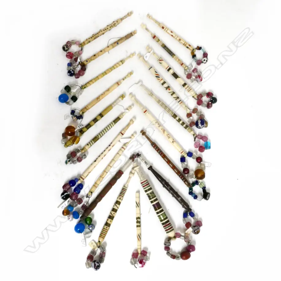 A collection of 20 antique beaded lace bobbins Image 1++